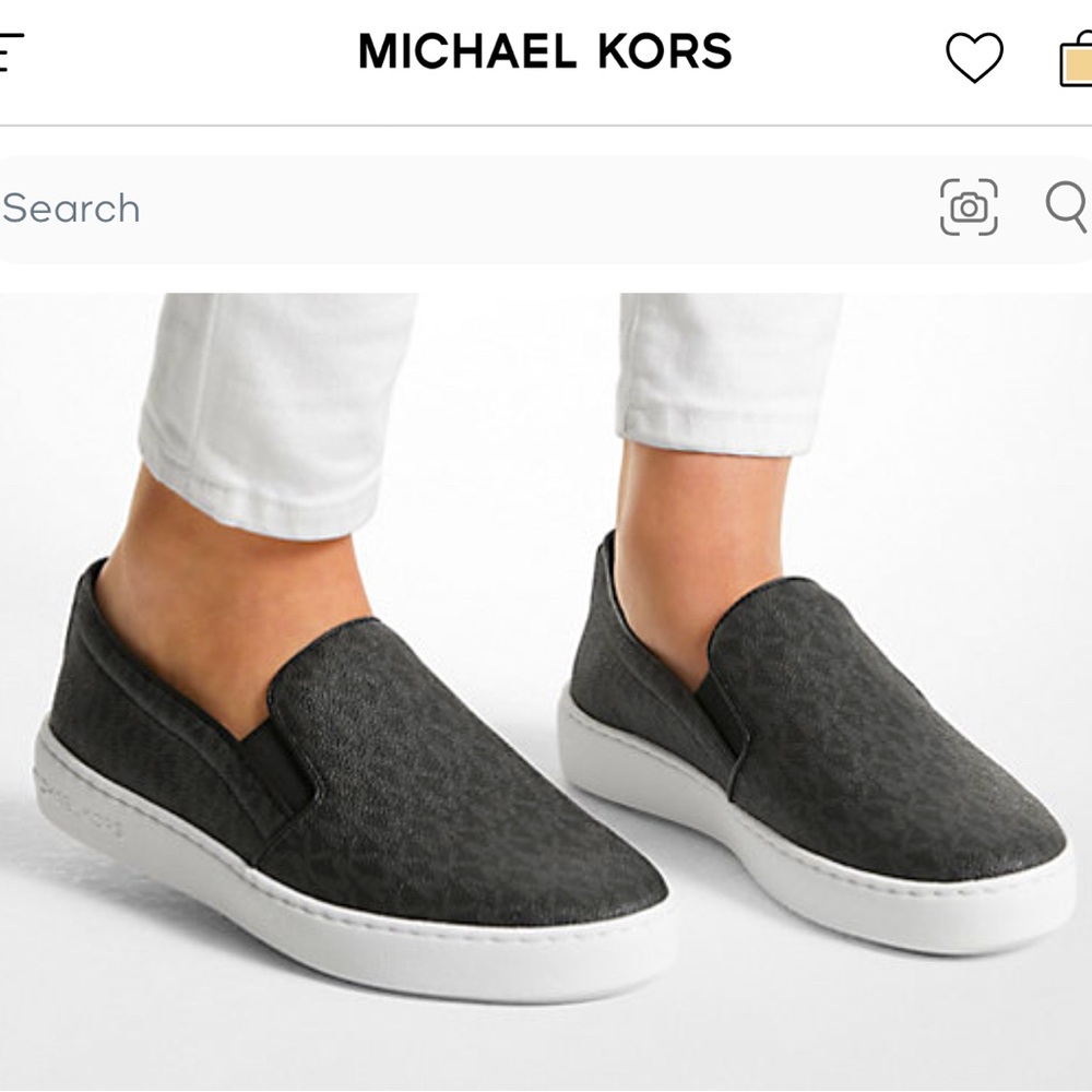 Gently used Micheal Kors slip on sneakers size 8 1/2. Keaton Logo SlipOn Sneaker